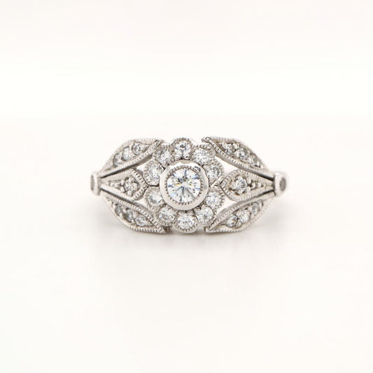 Flower and Petal ring with diamonds in white gold
