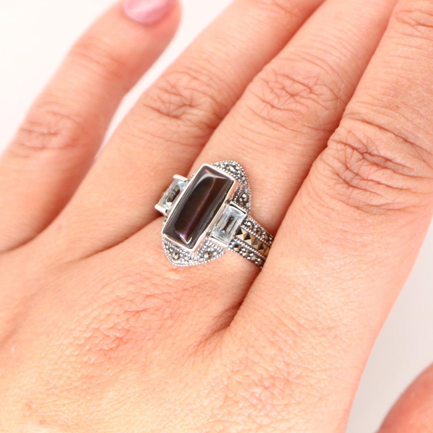 Silver lipped oyster shell and Pale Blue topaz ring with marcasite and Sterling Silver.