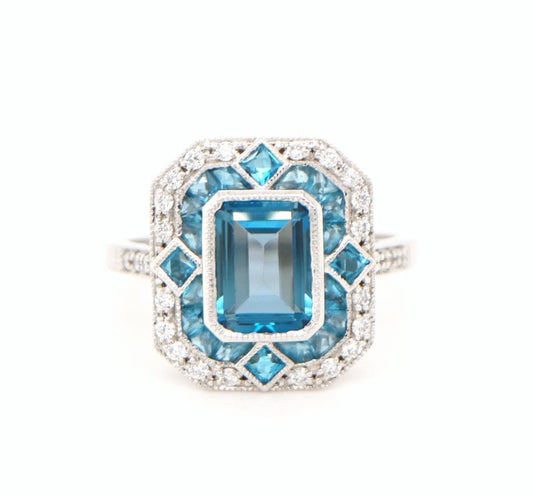 London blue topaz cocktail  ring with diamond halo in white gold, White gold engagement ring, Topaz wedding ring, Anniversary gift