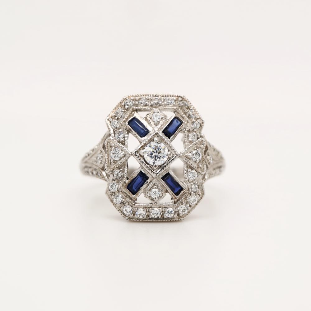 Shield ring with CZ center stone and Halo, with Sapphire Accents in Silver