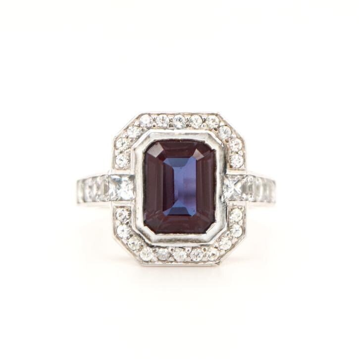 Laboratory grown Sapphire ring in Sterling Silver with CZ Halo
