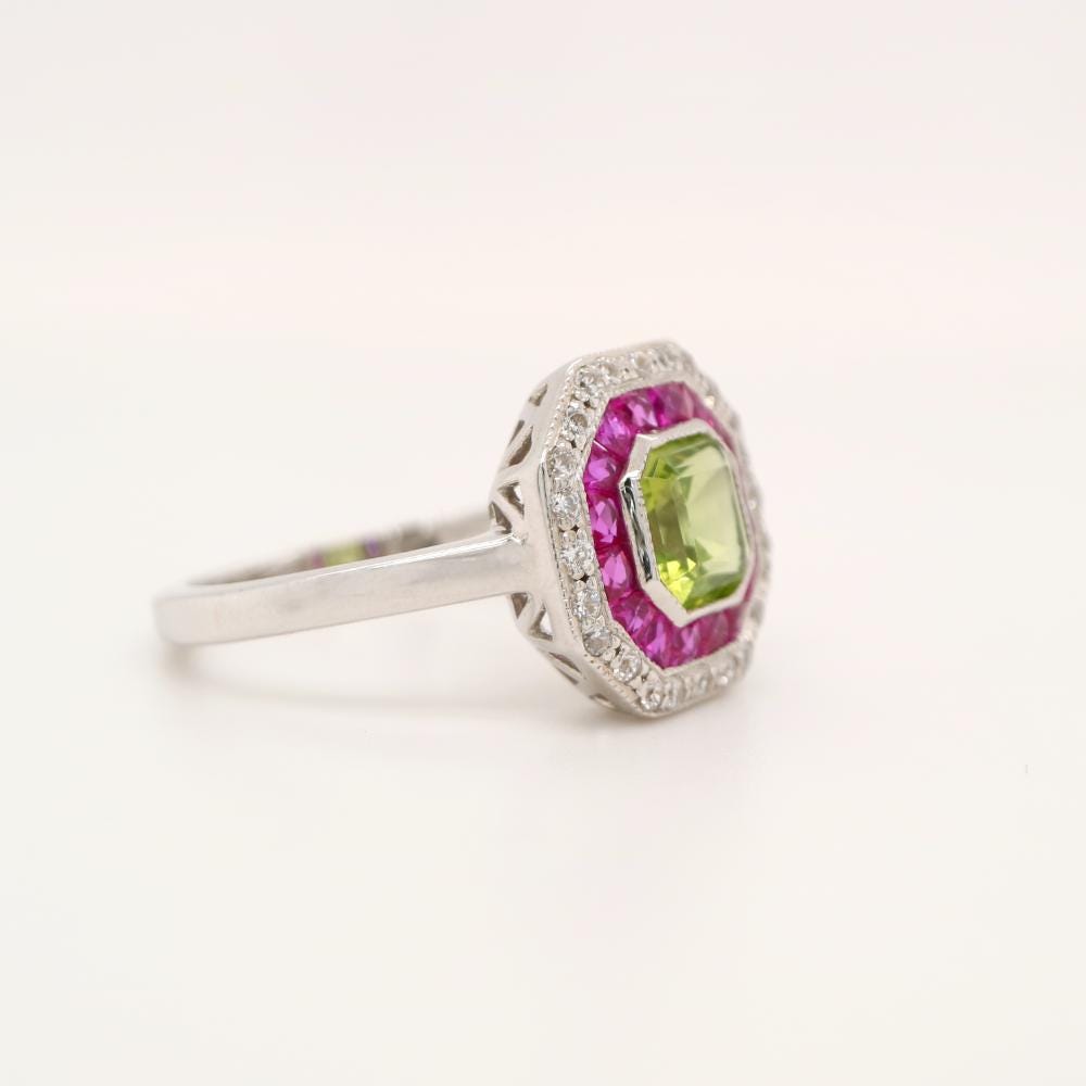 Peridot Target Ring with Ruby and Diamond Halo in White Gold