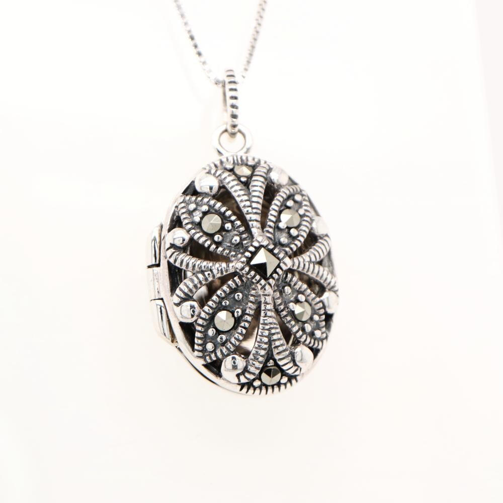 Flower locket in sterling silver with marcasite