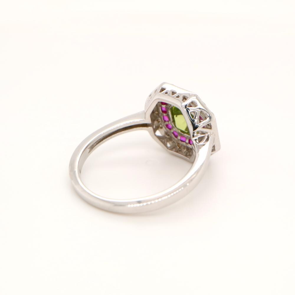 Peridot Target Ring with Ruby and Diamond Halo in White Gold