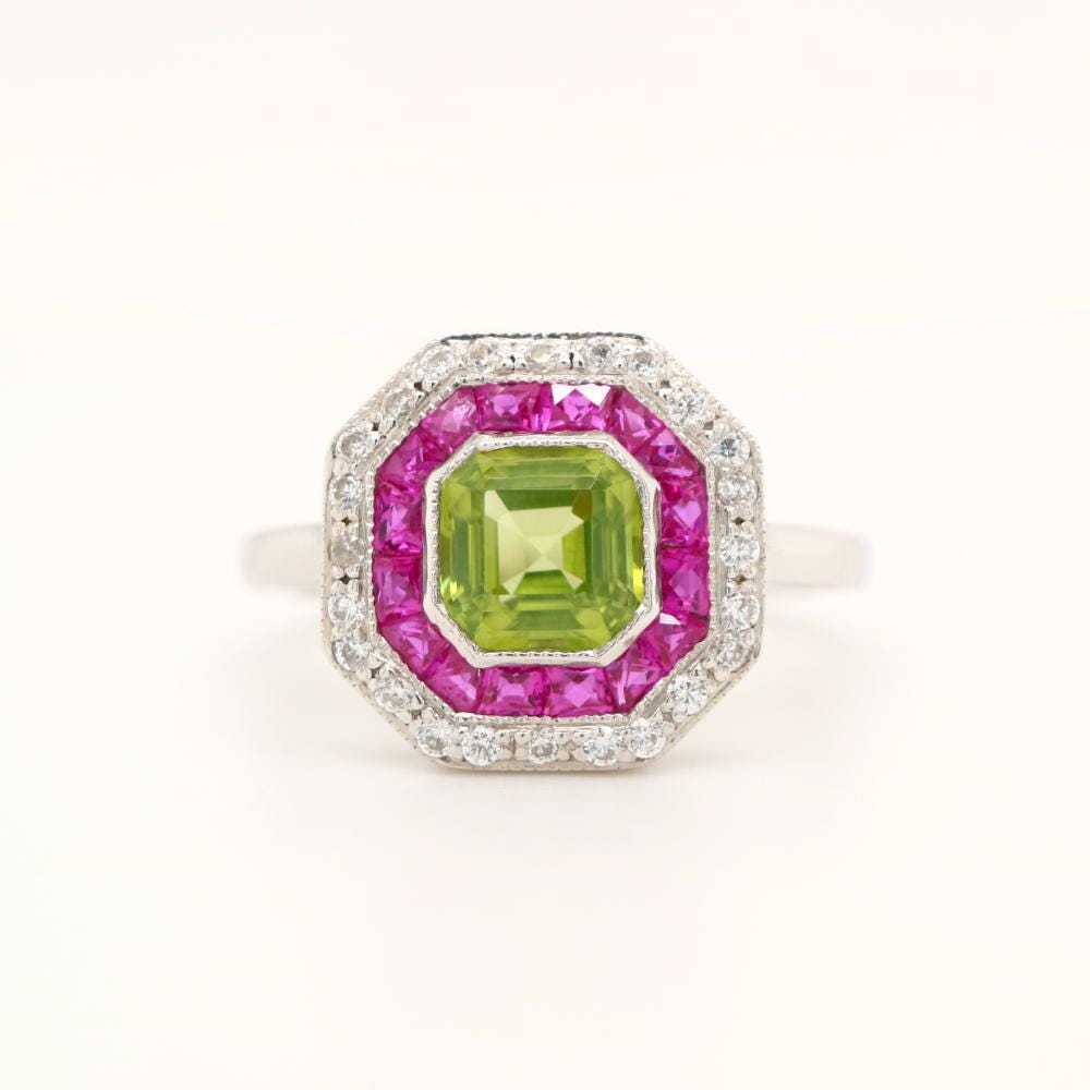 Peridot Target Ring with Ruby and Diamond Halo in White Gold
