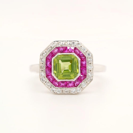 Peridot Target Ring with Ruby and Diamond Halo in White Gold