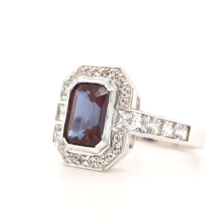 Laboratory grown Sapphire ring in Sterling Silver with CZ Halo