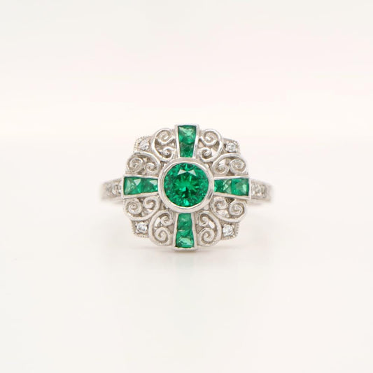 Filigree Emerald and Diamond ring in White Gold