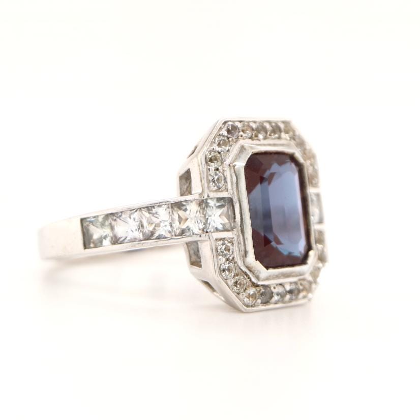 Laboratory grown Sapphire ring in Sterling Silver with CZ Halo