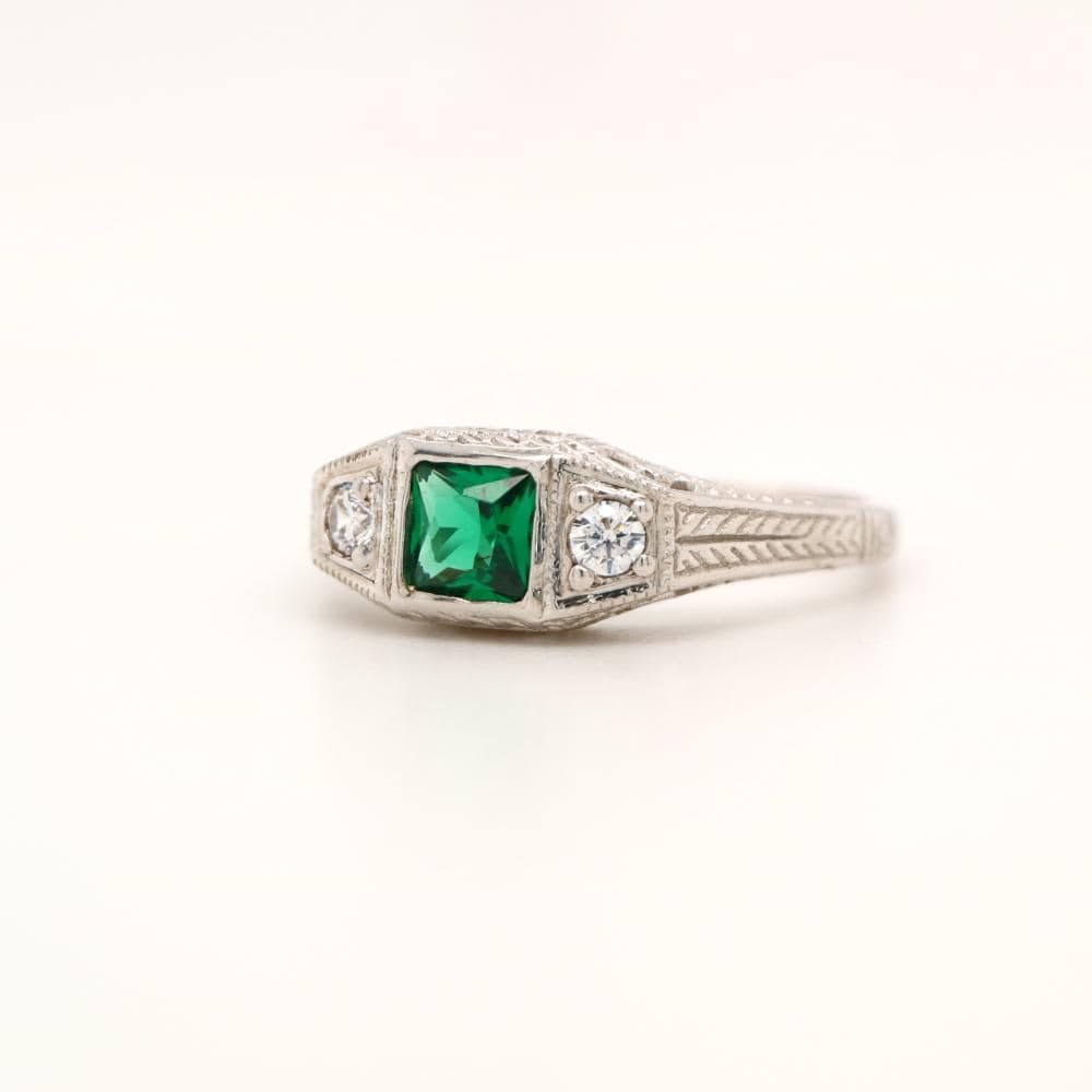 Art Deco Sterling Silver ring with Center Emerald and shoulder CZ