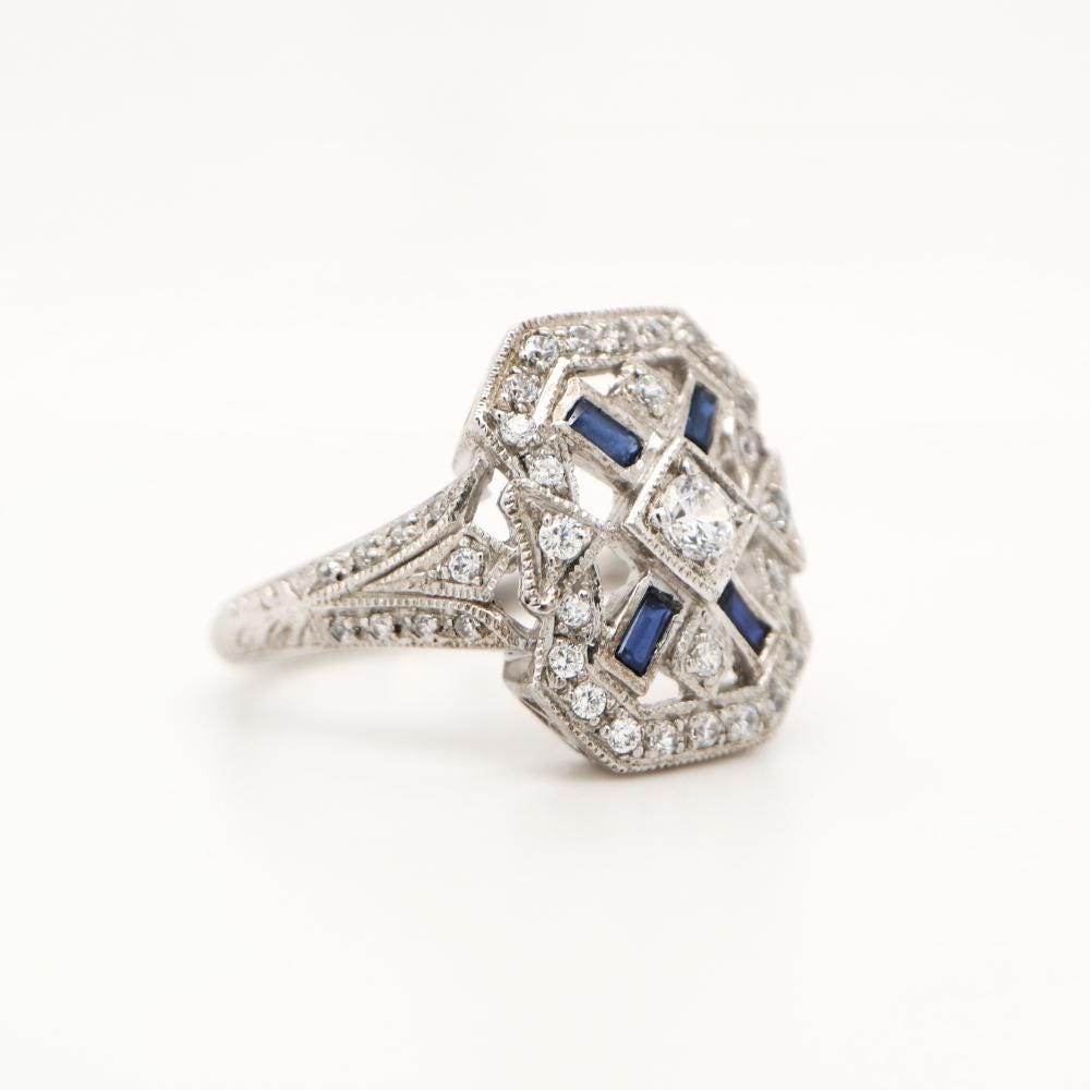 Shield ring with CZ center stone and Halo, with Sapphire Accents in Silver