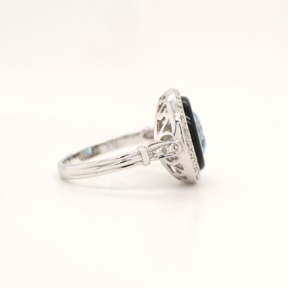 Blue Topaz Target ring with Onyx and Diamond halo