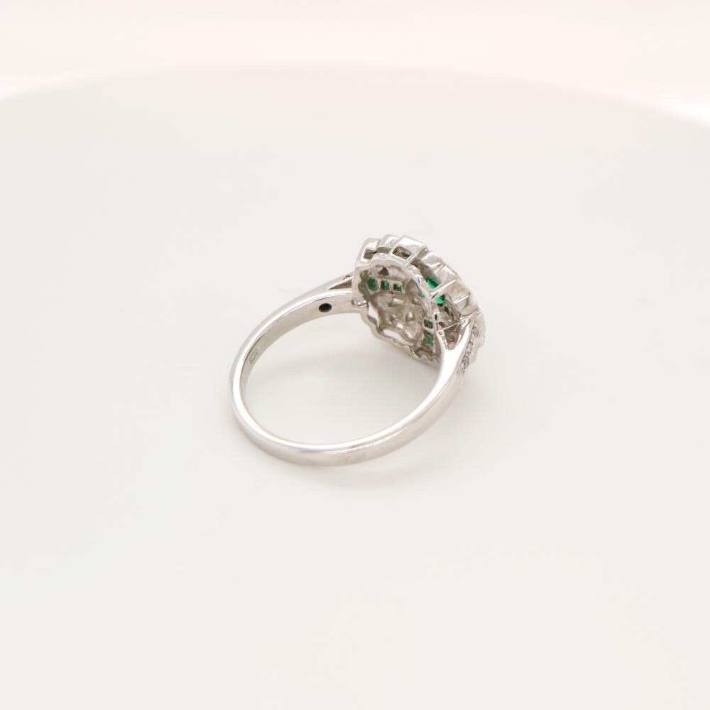Filigree Emerald and Diamond ring in White Gold