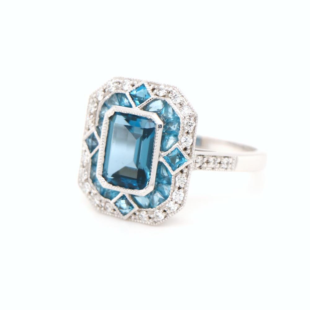 London blue topaz cocktail  ring with diamond halo in white gold, White gold engagement ring, Topaz wedding ring, Anniversary gift