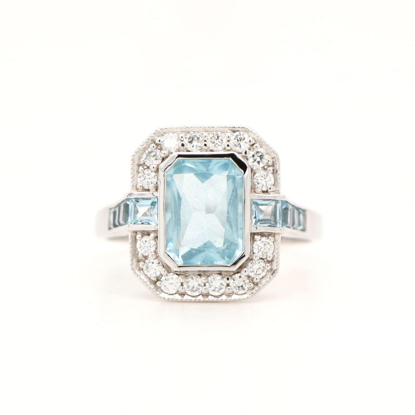 Aquamarine ring in Gold with Diamond Halo