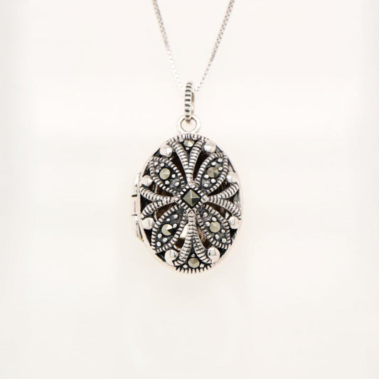 Flower locket in sterling silver with marcasite