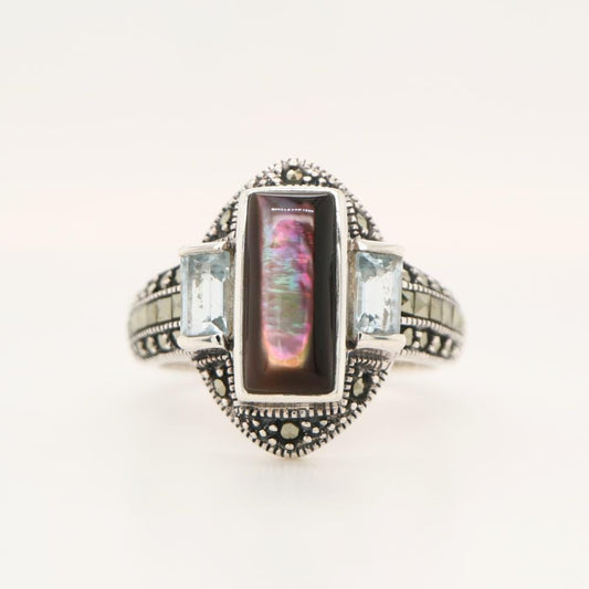 Silver lipped oyster shell and Pale Blue topaz ring with marcasite and Sterling Silver.