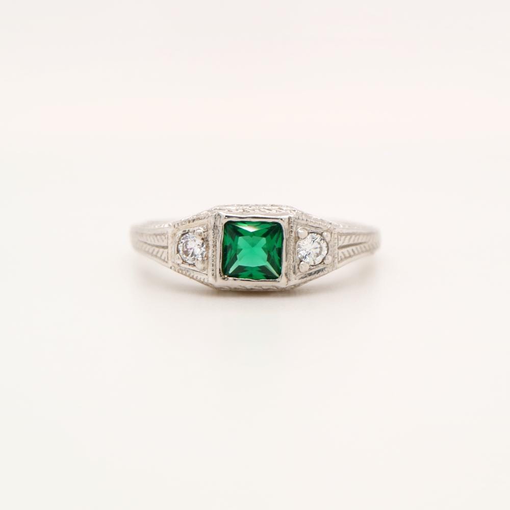 Art Deco Sterling Silver ring with Center Emerald and shoulder CZ
