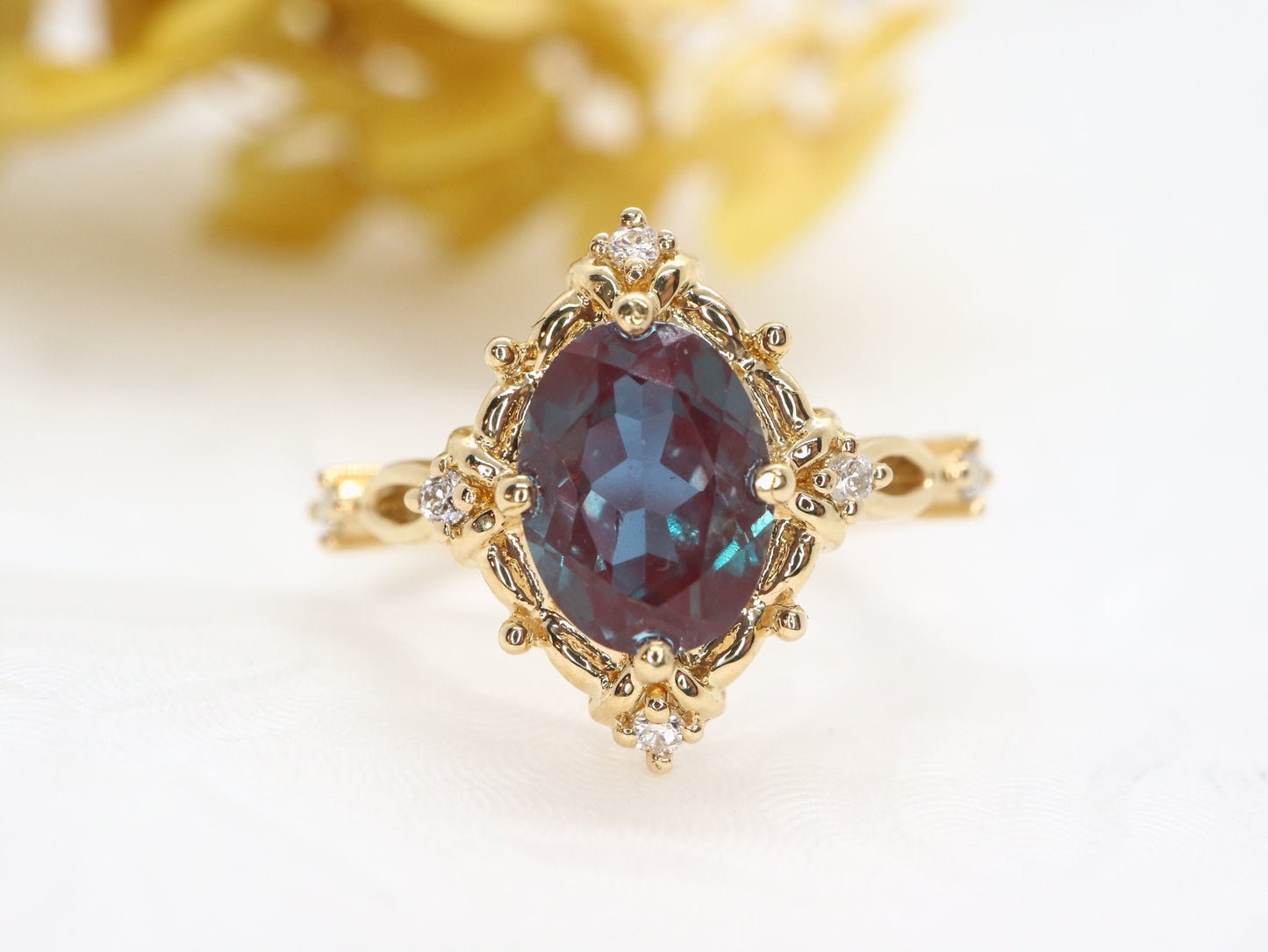Art Deco Vintage Oval Cut Diamond Engagement Ring in Yellow Gold with Lab Created Alexandrite Accent