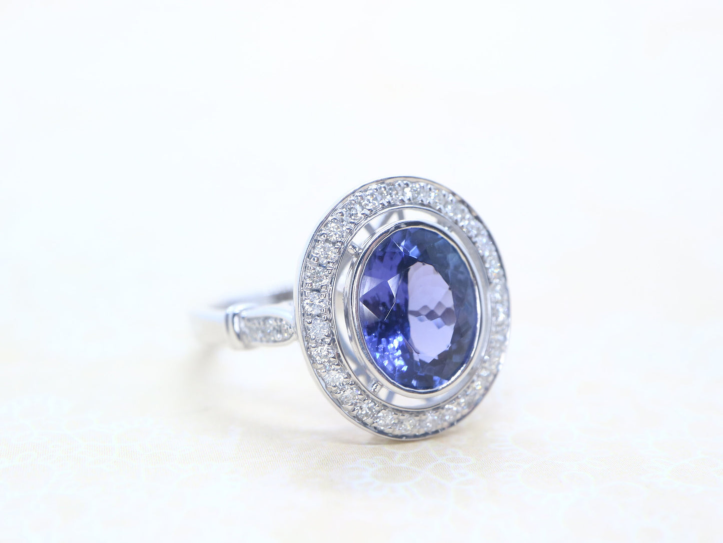 Tanzanite vintage halo ring in 18k white gold, Art deco style diamond ring with tanzanite